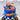 Hot Wheels racing themed birthday cake in blue with race cars, checkered flags, and personalized name