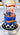 Hot Wheels racing themed birthday cake in blue with race cars, checkered flags, and personalized name