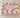 Lavender sheet cake with purple and ivory buttercream swirls, gold pearls and a birthday message.