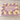 Lavender sheet cake with purple and ivory buttercream swirls, gold pearls and a birthday message.